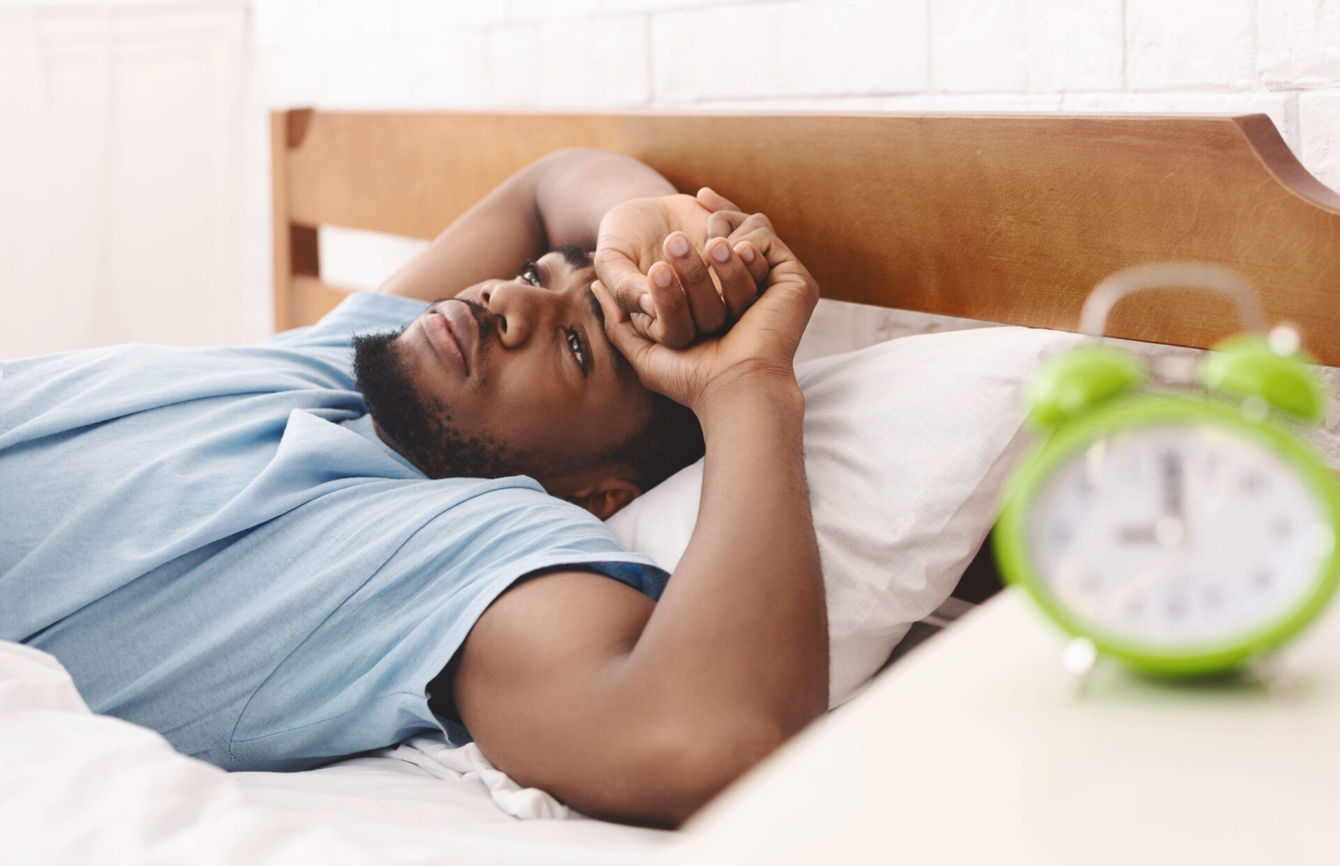 man suffering from insomnia and sleep disorder