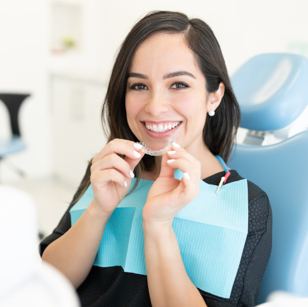woman with orthodonic device